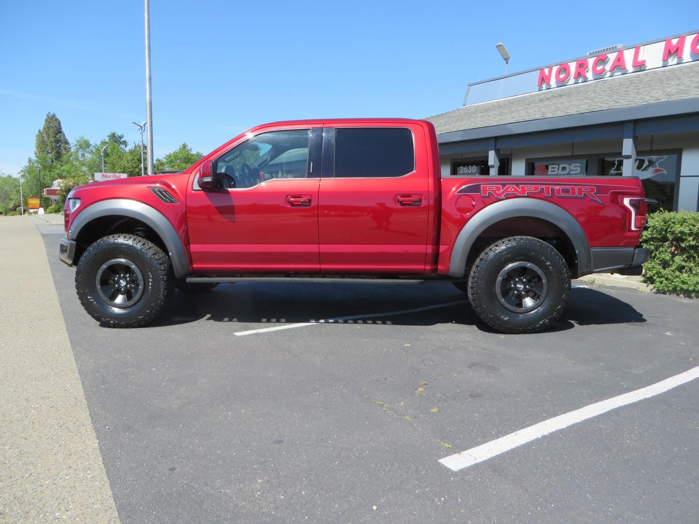 2018 MAROON /BLACK Ford F-150 Raptor SuperCrew 4WD (1FTFW1RG0JF) with an 3.5L engine, automatic transmission, located at 2630 Grass Valley Highway, Auburn, CA, 95603, (530) 508-5100, 38.937893, -121.095482 - Clean Raptor featuring a set of Eibach front springs, 37" BFG KO2 tires, and led fog lights. - Photo#7